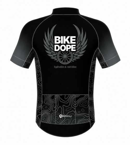 Black short-sleeve cycling jersey shown from the back, featuring a large gray winged 'BIKE DOPE' logo with a bicycle wheel motif, smaller 'hydration & nutrition' text, gray topographic contour line patterns near the lower back and sleeves, and the 'ROGELLI' brand logo near the hem.