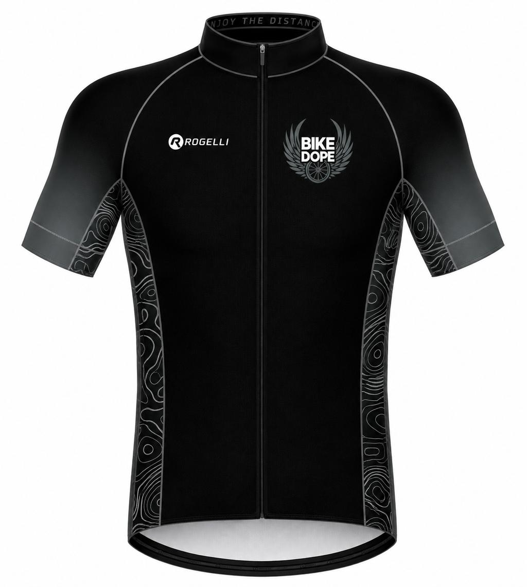 A black short-sleeve cycling jersey with a full front zipper, featuring the 'ROGELLI' brand logo on the right chest and a 'BIKE DOPE' winged logo on the left chest. The jersey has a subtle gray gradient on the sleeves and sides with white abstract wave patterns.